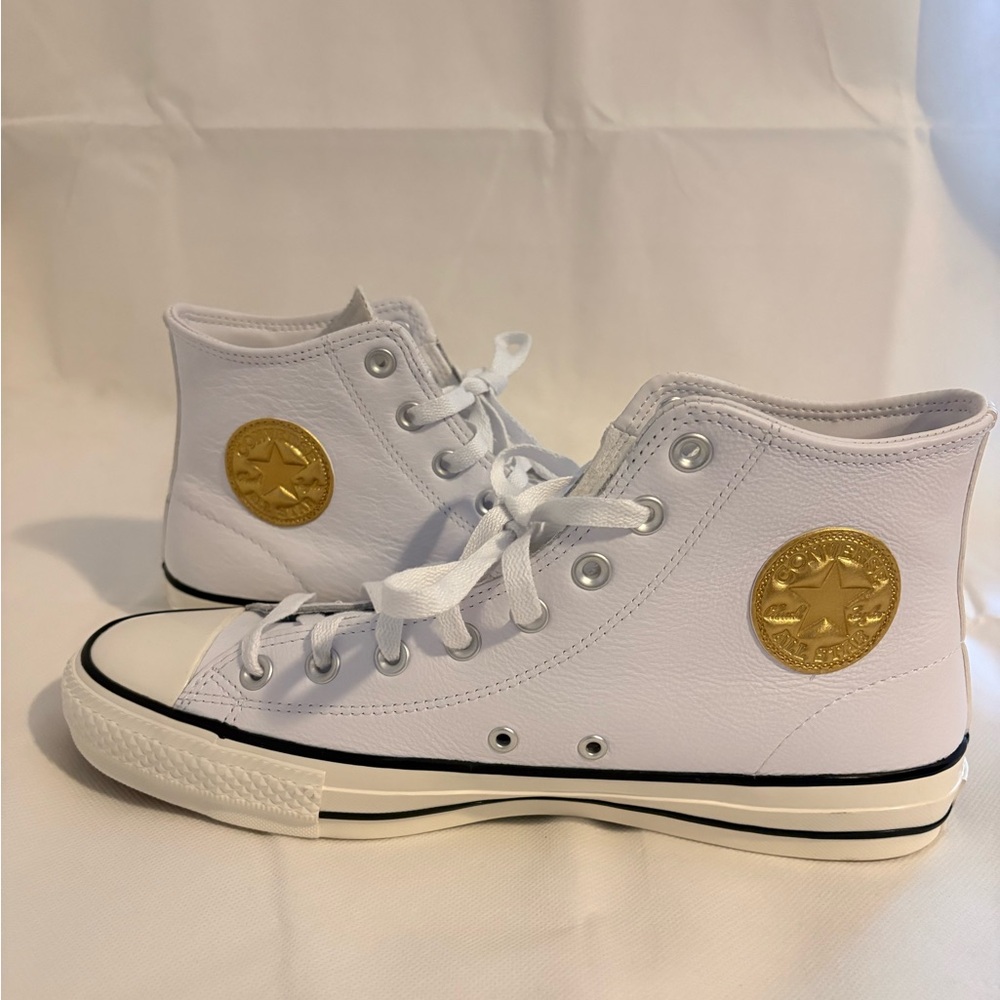 Converse Cons White High-Top Sneakers with Gold Star Emblem